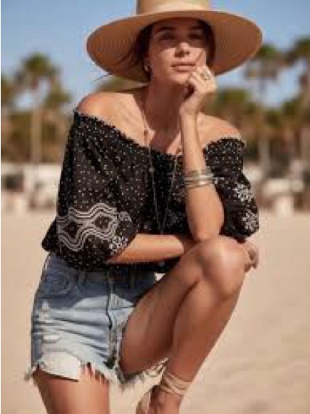 Sezane off the shoulder polka dot top in black and white
